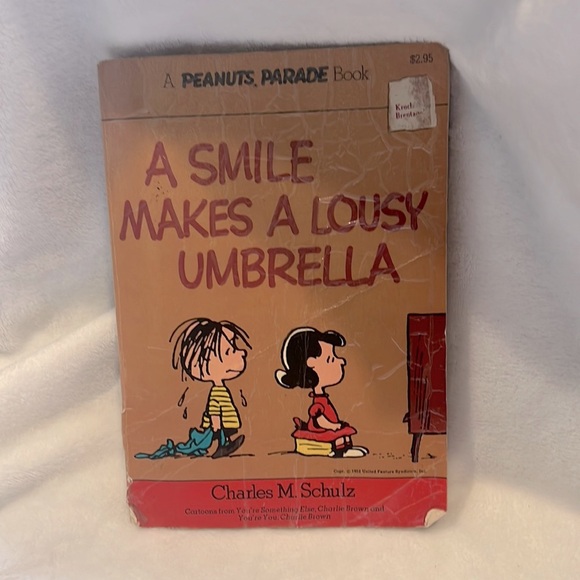 A Smile makes a lousy umbrella comic book - Picture 1 of 7